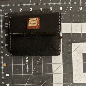 Dooney and Bourke trifold wallet in navy blue.